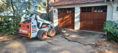 Bobcat removing old asphelt