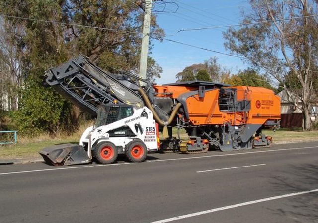 Bobcat and sweeper attachment